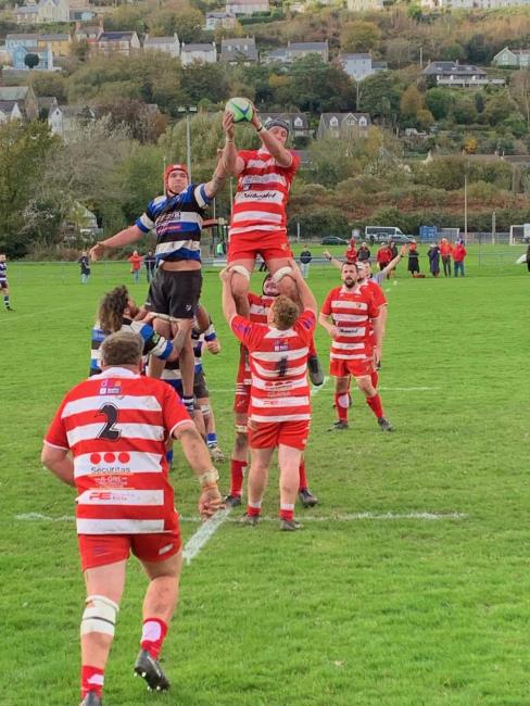 Osian Rowe battles hard for line-out ball